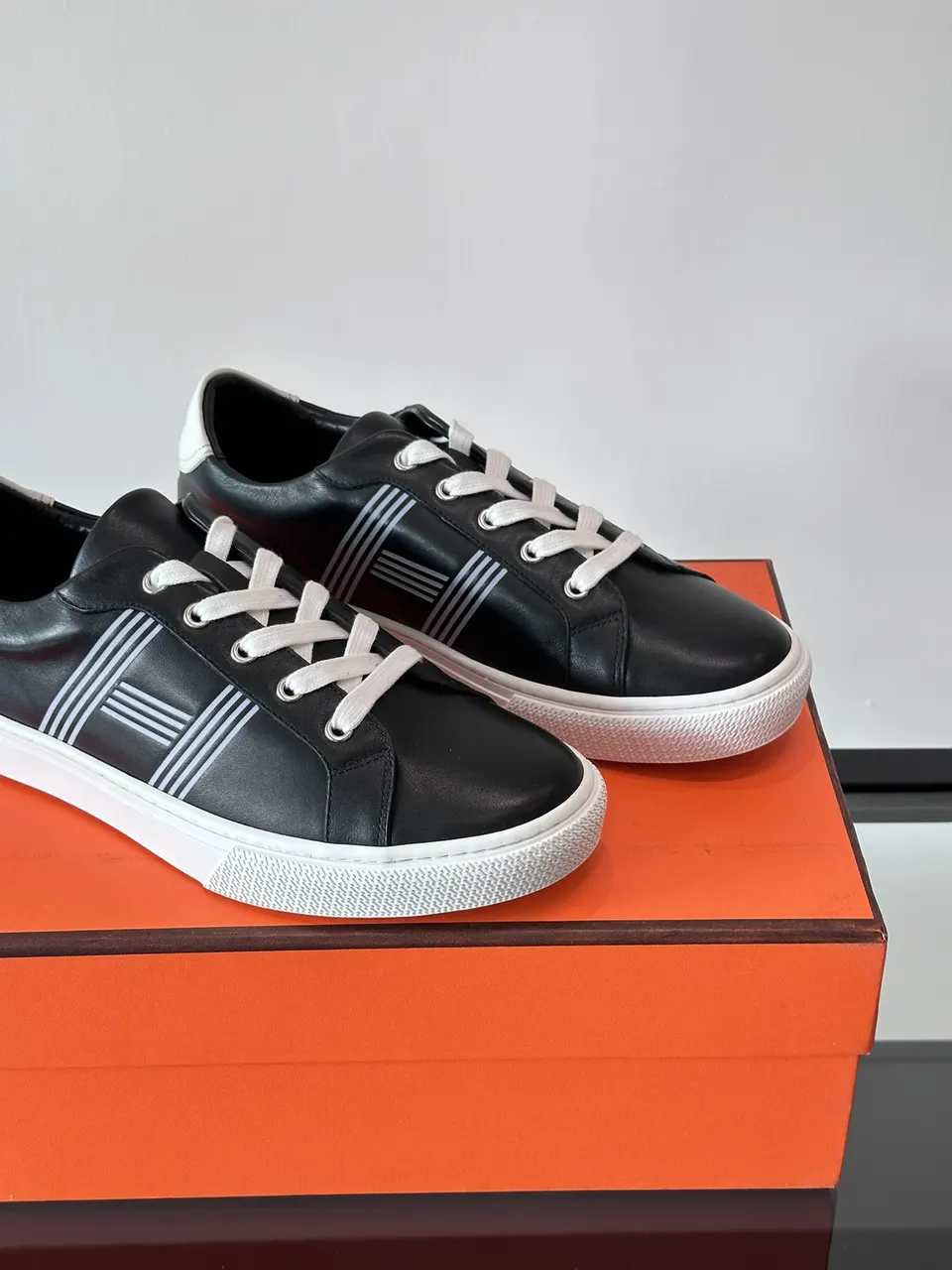 Hermes  Calfskin Mens Advantage Sneakers  Black White