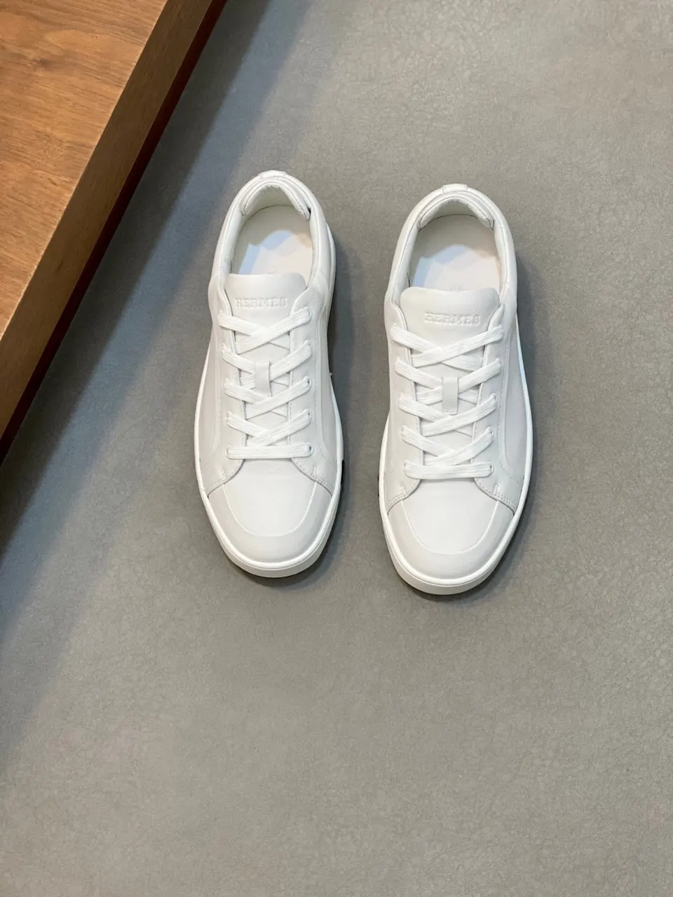Hermès All White Leather Sneakers - Sleek Design