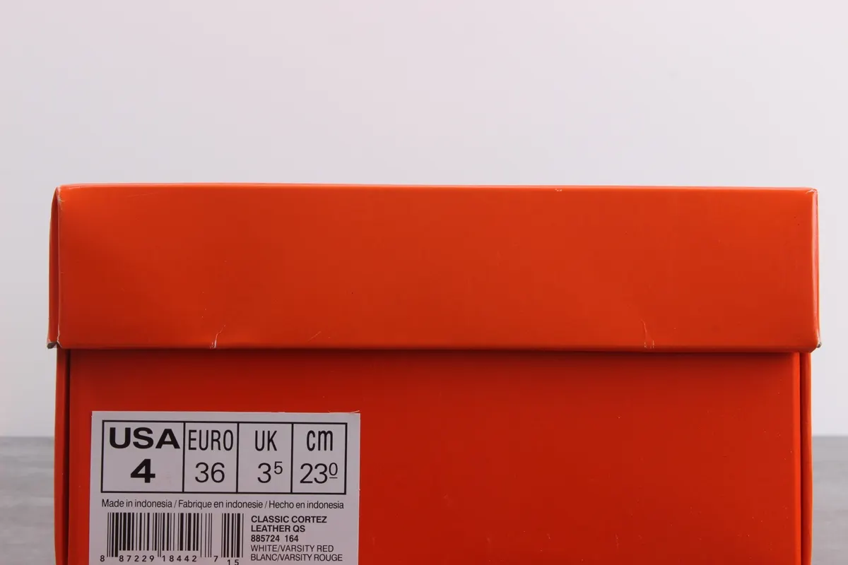 Nike Cortez leather trainers in white with red swoosh
