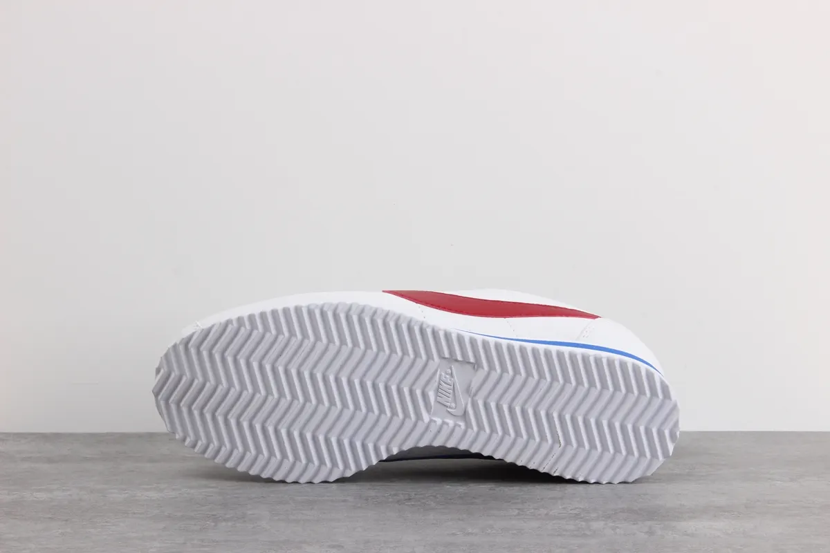 Nike Cortez leather trainers in white with red swoosh