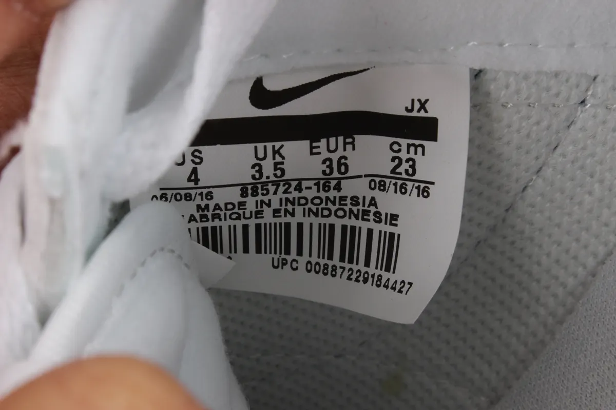 Nike Cortez leather trainers in white with red swoosh