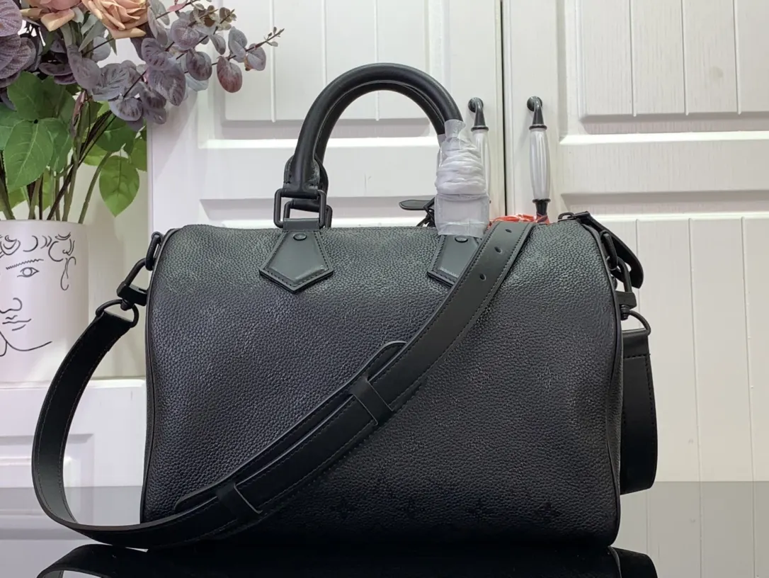 Speedy P9 Bandoulière 50 Autres Cuirs Monogram
